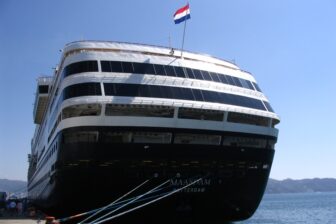 Holland America Line's MS Maasdam flying the Dutch flag (by Jean-Philippe Boulet, Wikimedia Commons)