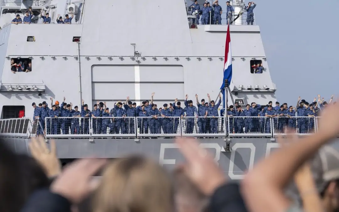 The HNLMS Evertsen crew waving goodbye to their loved ones as it sets sail for the Middle East (photo Ministry of Defence)
